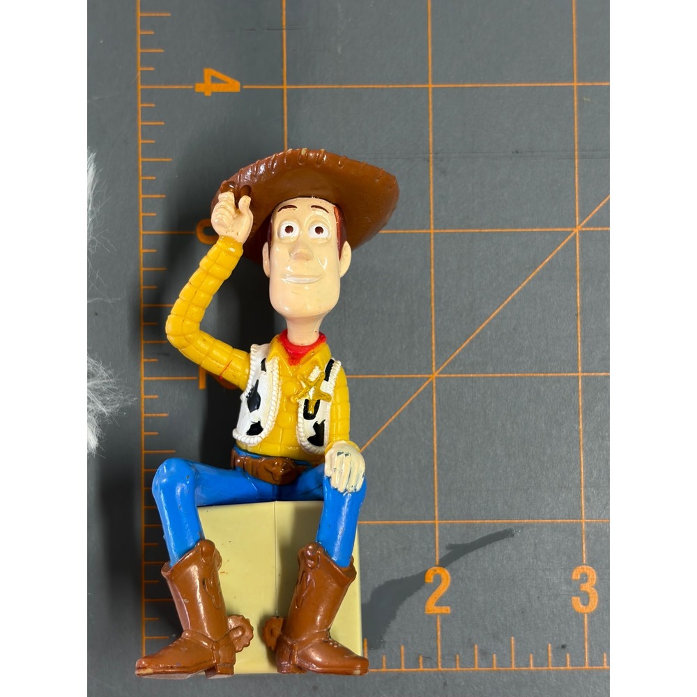 Disney Toy Story Woody Action Figure Yellow Seated on Block